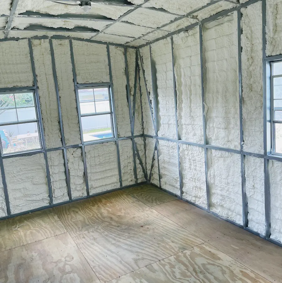 Closed-cell spray foam insulation applied to wall cavities in a residential project in Sunny Isles Beach